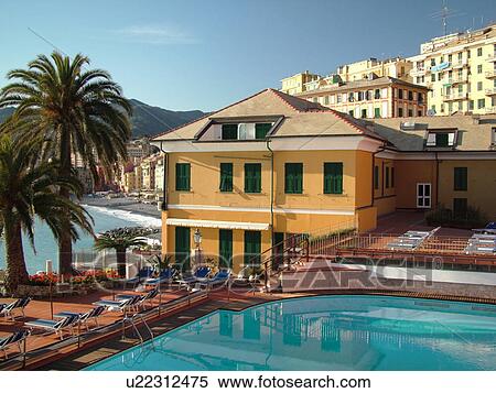 Stock Photography -  Liguria, Italy, Camogli, Riviera di Levante, Ligurian Riviera, Europe, Swimming pool of a resort hotel overlooking the Ligurian Sea in the resort town of Camogli.. Fotosearch