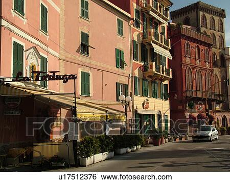 Stock Photograph -  Liguria, Italy, Sestri Levante, Riviera di Levante, Ligurian Riviera, Europe, Buildings along the waterfront of the Ligurian Sea in the resort town of Sestri Levante.. Fotosearch