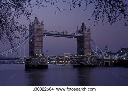 London, England, Great Britain, United Kingdom, Europe, Tower Bridge crosses the River Thames in London in the evening. View Large Photo Image Picture - London, England, Great Britain, United Kingdom, Europe, Tower Bridge crosses the River Thames in London in the evening.. Fotosearch