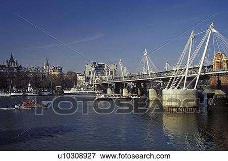 London, England, Great Britain, United Kingdom, Europe, Hungerford Foot Bridge crosses the River Thames. View Large Photo Image Stock Photo - London, England, Great Britain, United Kingdom, Europe, Hungerford Foot Bridge crosses the River Thames. . Fotosearch