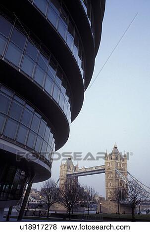 Stock Photo -  London, England, Great Britain, United Kingdom, Europe, City Hall and Tower Bridge crossing the River Thames.. Fotosearch