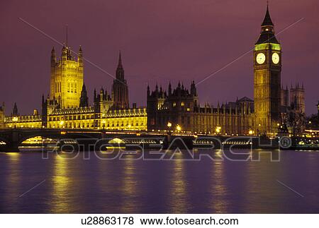 Stock Photo -  London, England, Great Britain, United Kingdom, Europe, Parliament Buildings, Big Ben, and Westminster Bridge in Westminster along the River Thames in the evening. . Fotosearch