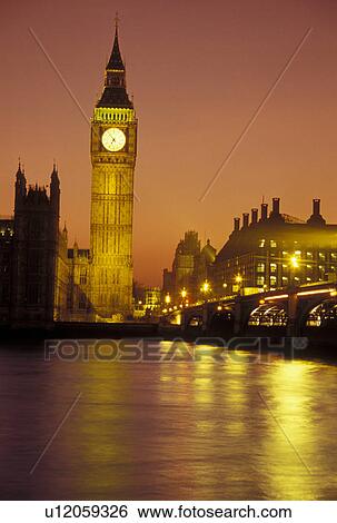 Stock Photograph -  London, England, Great Britain, United Kingdom, Europe, Big Ben in Westminster along the River Thames in the evening. . Fotosearch