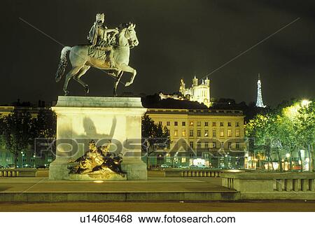 Lyon, France, Rhone-Alpes, Europe, Louis XIV statue illuminated at night in Place Bellecour in downtown Lyon. View Large Photo Image Stock Photo - Lyon, France, Rhone-Alpes, Europe, Louis XIV statue illuminated at night in Place Bellecour in downtown Lyon.. Fotosearch