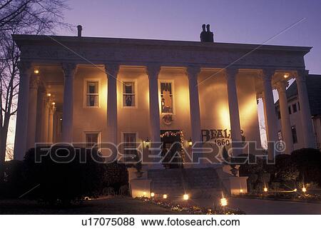 Stock Photo -  Macon, GA, Georgia, Historic Macon, Beall's 1860 Restaurant, Greek Revival Mansion, evening. Fotosearch