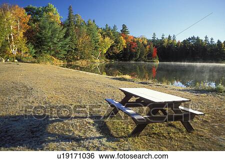 ME, Maine, Baxter State Park, Picnic table on Abol Beach along Abol Pond in Baxter State Park in the fall. View Large Photo Image Stock Photograph - ME, Maine, Baxter State Park, Picnic table on Abol Beach along Abol Pond in Baxter State Park in the fall. . Fotosearch
