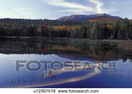 ME, Maine, Baxter State Park, Scenic view of Mt. Katahdin reflecting in the calm waters of Abol Pond in Baxter State Park in the fall. View Large Photo Image Stock Photo - ME, Maine, Baxter State Park, Scenic view of Mt. Katahdin reflecting in the calm waters of Abol Pond in Baxter State Park in the fall. . Fotosearch