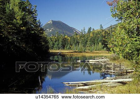 Stock Photography -  ME, Maine, Baxter State Park, Scenic view of Double Top Mountain from Tracy Pond in Baxter State Park in the fall. . Fotosearch