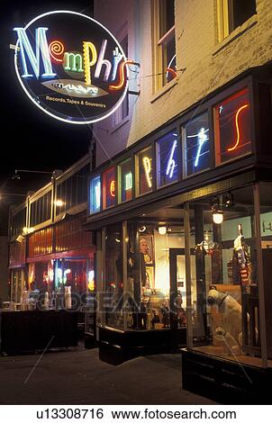 Memphis, TN, Tennessee, Blues Clubs and souvenir shops along Beale Street, evening, neon lights View Large Photo Image Stock Photograph - Memphis, TN, Tennessee, Blues Clubs and souvenir shops along Beale Street, evening, neon lights. Fotosearch