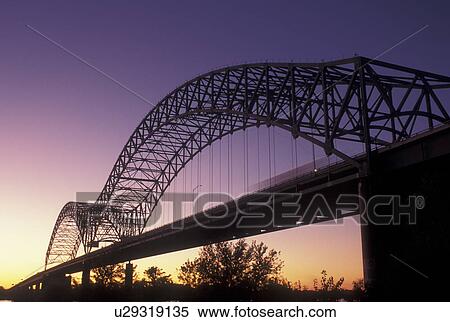 Stock Photography -  Memphis, TN, Tennessee, Hernando Desoto Memorial Bridge over the Mississippi River at sunset. Fotosearch