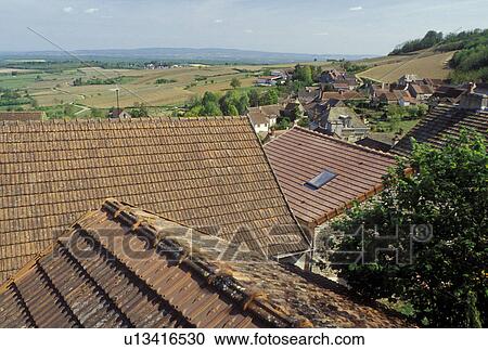 Montagny-les-Buxy, France, Burgundy, Saone-et-Loire, Bourgogne, Europe, wine region, Scenic view of the rooftops and countryside in the town of Montagny-les-Buxy in the wine region of Burgundy in early spring. View Large Photo Image Stock Image - Montagny-les-Buxy, France, Burgundy, Saone-et-Loire, Bourgogne, Europe, wine region, Scenic view of the rooftops and countryside in the town of Montagny-les-Buxy in the wine region of Burgundy in early spring.. Fotosearch