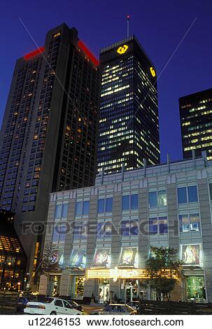 Stock Image -  Montreal, Canada, Quebec, High rise buildings in the evening in downtown Montreal.. Fotosearch