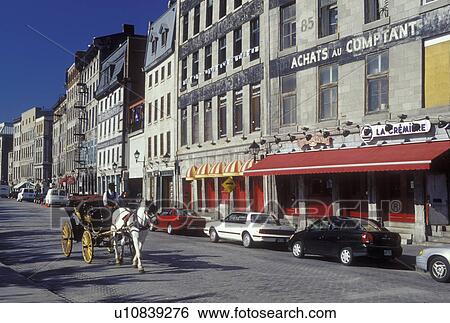 Stock Photograph -  Montreal, Canada, Quebec, Horse-drawn carriage ride at the Old Port (Vieux Port) in Old Montreal (Vieux Montreal).. Fotosearch