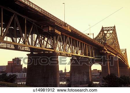 Montreal, Canada, Quebec, Pont Jacques Cartier (Jacques Cartier Bridge) at sunset crossing the St. Lawrence River (Fleuve Saint-Laurent) in Montreal. View Large Photo Image Stock Image - Montreal, Canada, Quebec, Pont Jacques Cartier (Jacques Cartier Bridge) at sunset crossing the St. Lawrence River (Fleuve Saint-Laurent) in Montreal.. Fotosearch