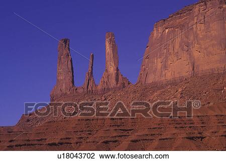 Monument Valley Navajo Tribal Park, AZ, Arizona, Three Sisters, buttes View Large Photo Image Stock Image - Monument Valley Navajo Tribal Park, AZ, Arizona, Three Sisters, buttes. Fotosearch