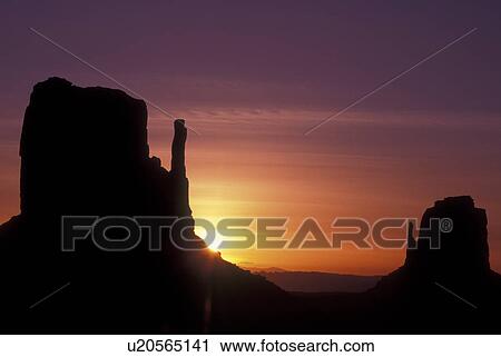 Stock Image -  Monument Valley Navajo Tribal Park, AZ, Arizona, The Mittens Butte, sunrise. Fotosearch
