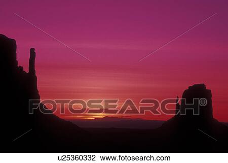 Stock Image -  Monument Valley Navajo Tribal Park, AZ, Arizona, The Mittens Butte, sunrise. Fotosearch