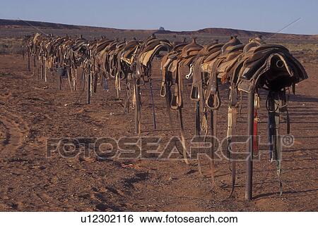 Monument Valley Navajo Tribal Park, AZ, Arizona, Mitchel Butte, saddles View Large Photo Image Stock Photograph - Monument Valley Navajo Tribal Park, AZ, Arizona, Mitchel Butte, saddles. Fotosearch