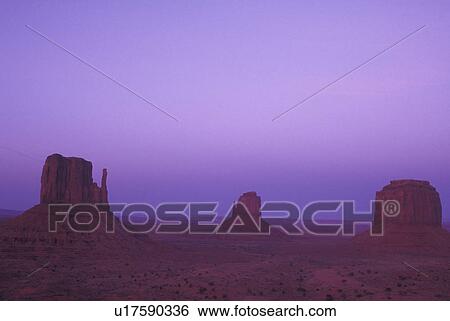 Stock Photograph -  Monument Valley Navajo Tribal Park, AZ, Arizona, The Mittens Butte, sunset. Fotosearch