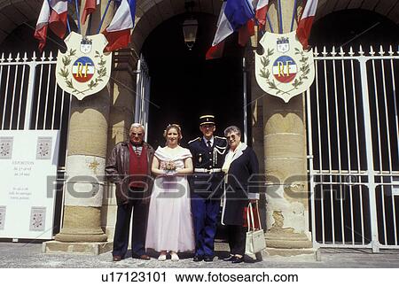 Moulins, Auvergne, France, Allier, Europe, Wedding party poses outside the Hotel de Ville in the city of Moulins. View Large Photo Image Stock Image - Moulins, Auvergne, France, Allier, Europe, Wedding party poses outside the Hotel de Ville in the city of Moulins.. Fotosearch