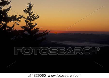 Stock Image -  NC, North Carolina, Pisgah National Forest, mountains, sunrise. Fotosearch