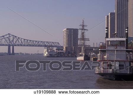 Stock Photo -  New Orleans, LA, Louisiana, Mississippi River, Excursion boat along the Riverfront. Fotosearch