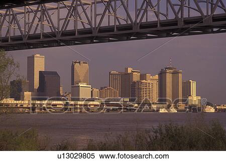 Stock Photography -  New Orleans, LA, Louisiana, Mississippi River, Greater New Orleans Bridge, skyline. Fotosearch