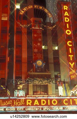 New York City, NY, New York, downtown, Radio City Music Hall, Christmas Spectacular, neon lights, evening View Large Photo Image Stock Photo - New York City, NY, New York, downtown, Radio City Music Hall, Christmas Spectacular, neon lights, evening. Fotosearch