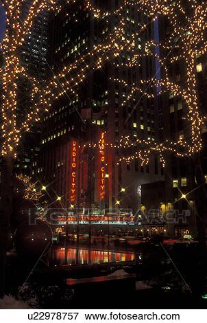 New York City, NY, New York, downtown, Radio City Music Hall, Christmas lights & decorations, fountain, evening View Large Photo Image Stock Photo - New York City, NY, New York, downtown, Radio City Music Hall, Christmas lights & decorations, fountain, evening. Fotosearch