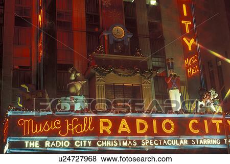 New York City, NY, New York, downtown, Radio City Music Hall, Christmas Spectacular, neon lights, evening View Large Photo Image Stock Photo - New York City, NY, New York, downtown, Radio City Music Hall, Christmas Spectacular, neon lights, evening. Fotosearch