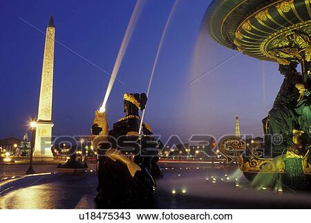 Stock Image -  obelisk, Paris, Ile de France, France, Europe, The Obelisque and fountain at Place de la Concorde in the city of Paris in the evening.. Fotosearch