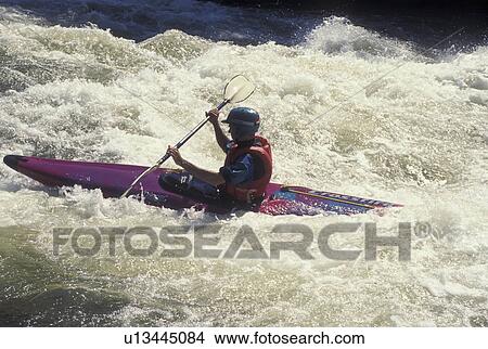 Ocoee River, TN, Tennessee, Appalachian Mountains, Man white water kayaking on the Ocoee River in Cherokee National Forest. View Large Photo Image Picture - Ocoee River, TN, Tennessee, Appalachian Mountains, Man white water kayaking on the Ocoee River in Cherokee National Forest.. Fotosearch