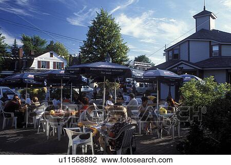 Stock Image -  outdoor cafT, Canada, Quebec, Laurentians, Saint-Jovite, Outdoor cafT in downtown Saint-Jovite.. Fotosearch