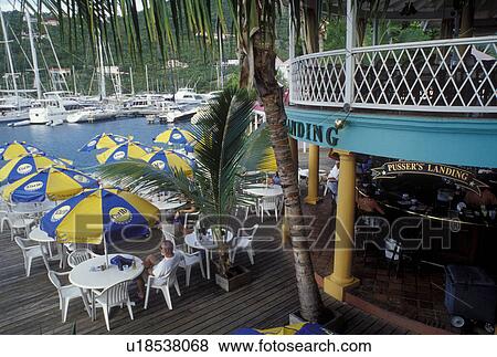 outdoor cafT, Tortola, West End, British Virgin Islands, Caribbean, BVI, Sopers Hole, Pusser's Landing on the waterfront of Frenchman's Cay on the island of Tortola. View Large Photo Image Stock Photo - outdoor cafT, Tortola, West End, British Virgin Islands, Caribbean, BVI, Sopers Hole, Pusser's Landing on the waterfront of Frenchman's Cay on the island of Tortola.. Fotosearch