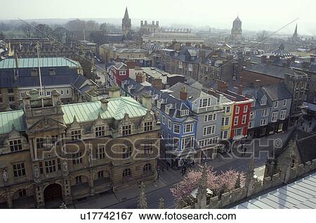 Stock Photo -  Oxford, England, Great Britain, United Kingdom, Europe, View of buildings along High Street from St. Mary the Virgin in downtown Oxford, Britain's oldest university town.. Fotosearch