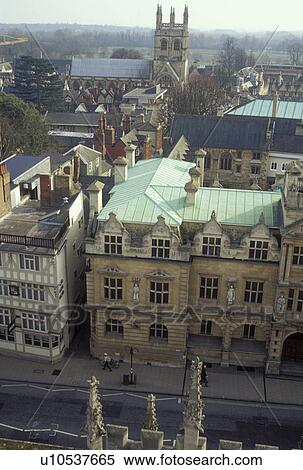 Stock Photography -  Oxford, England, Great Britain, United Kingdom, Europe, View of buildings along High Street from St. Mary the Virgin in downtown Oxford, Britain's oldest university town.. Fotosearch