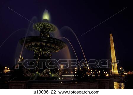 Paris, Ile de France, France, Europe, The Obelisque and fountain at Place de la Concorde in the city of Paris in the evening. View Large Photo Image Stock Image - Paris, Ile de France, France, Europe, The Obelisque and fountain at Place de la Concorde in the city of Paris in the evening.. Fotosearch
