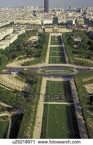 Stock Image -  Paris, Ile de France, France, Europe, Aerial view of Parc du Champ de Mars in the city of Paris looking Southeast from the Eiffel Tower.. Fotosearch