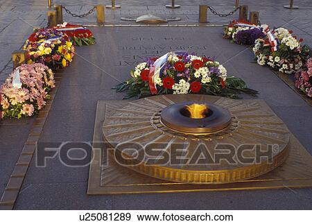 Stock Photo -  Paris, Ile de France, France, Europe, The eternal flame at the World War I War Memorial at the Arc de Triomphe in Paris.. Fotosearch
