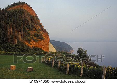 Stock Image -  Perce. Gaspe Peninsula, Quebec, Canada, Gulf of St. Lawrence, Scenic coastline of Perce along the Gulf of St. Lawrence on the Gaspe Peninsula.. Fotosearch