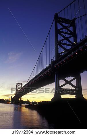 Picture -  Philadelphia, PA, Pennsylvania, Ben Franklin Bridge, Delaware River, evening. Fotosearch