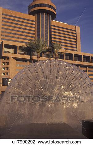 Stock Image -  Phoenix, AZ, Arizona, downtown, Fountain at Symphony Hall & Hyatt Regency. Fotosearch