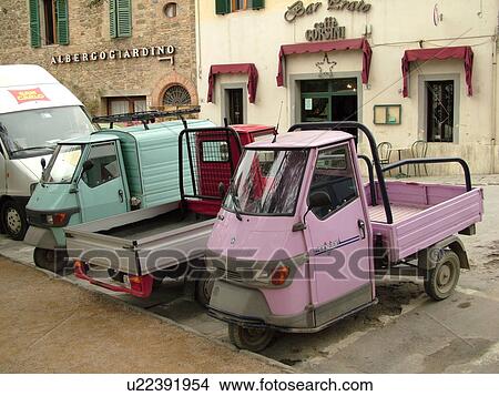 pick-up trucks, Tuscany, Italy, Montalcino, Toscana, Europe, Small pick-up trucks parked along the road in the city of Montalcino. View Large Photo Image Picture - pick-up trucks, Tuscany, Italy, Montalcino, Toscana, Europe, Small pick-up trucks parked along the road in the city of Montalcino.. Fotosearch