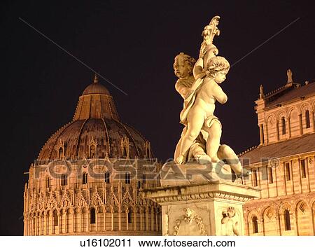 Pisa, Tuscany, Italy, Toscana, Europe, The Cathedral and The Baptistery and the Cupid Statue in Campo dei Miracoli (Field of Miracles) in the evening in the city of Pisa. View Large Photo Image Stock Image - Pisa, Tuscany, Italy, Toscana, Europe, The Cathedral and The Baptistery and the Cupid Statue in Campo dei Miracoli (Field of Miracles) in the evening in the city of Pisa.. Fotosearch