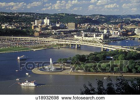Stock Photo -  Pittsburgh, PA, Pennsylvania, downtown, aerial, Allegheny River, Monongahela River, Point State Park, sightseeing cruise boats. Fotosearch
