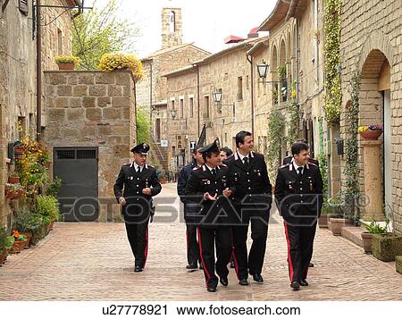 policemen, Tuscany, Italy, Sovana, Toscana, Europe, Italian Carabinieri walking through the medieval town of Sovana. View Large Photo Image Stock Image - policemen, Tuscany, Italy, Sovana, Toscana, Europe, Italian Carabinieri walking through the medieval town of Sovana.. Fotosearch