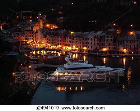Portofino, Italy, Riviera di Levante, Liguria, Ligurian Riviera, Europe, Scenic view of the harbor of the resort town of Portofino at night along the Ligurian Sea. View Large Photo Image Stock Photo - Portofino, Italy, Riviera di Levante, Liguria, Ligurian Riviera, Europe, Scenic view of the harbor of the resort town of Portofino at night along the Ligurian Sea.. Fotosearch