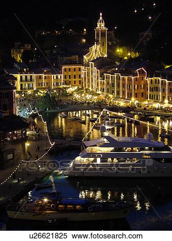 Portofino, Italy, Riviera di Levante, Ligurian Riviera, Liguria, Europe, Scenic view of the buildings illuminated at night along the waterfront of the resort town of Portofino on the Ligurian Sea. View Large Photo Image Stock Photography - Portofino, Italy, Riviera di Levante, Ligurian Riviera, Liguria, Europe, Scenic view of the buildings illuminated at night along the waterfront of the resort town of Portofino on the Ligurian Sea.. Fotosearch
