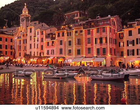 Portofino, Liguria, Italy, Riviera di Levante, Ligurian Riviera, Europe, Boats in the harbor of the resort town of Portofino in the evening along the Ligurian Sea. View Large Photo Image Picture - Portofino, Liguria, Italy, Riviera di Levante, Ligurian Riviera, Europe, Boats in the harbor of the resort town of Portofino in the evening along the Ligurian Sea.. Fotosearch