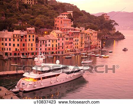 Portofino, Liguria, Italy, Riviera di Levante, Ligurian Riviera, Europe, Scenic view of the harbor of the resort town of Portofino at sunset along the Ligurian Sea. View Large Photo Image Stock Image - Portofino, Liguria, Italy, Riviera di Levante, Ligurian Riviera, Europe, Scenic view of the harbor of the resort town of Portofino at sunset along the Ligurian Sea.. Fotosearch